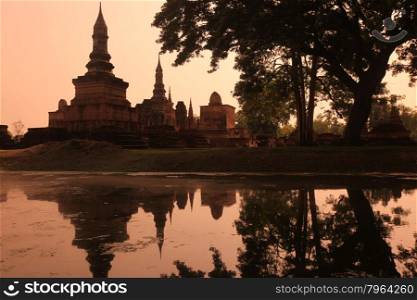 the Wat Mahathat Temple at the Historical Park in Sukothai in the Provinz Sukhothai in the north of Bangkok in Thailand, Southeastasia.