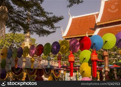 The Wat Pha Khao with thai umbrellas in the city of Chiang Mai at north Thailand. Thailand, Chiang Mai, November, 2019. THAILAND CHIANG MAI WAT PHA KHAO