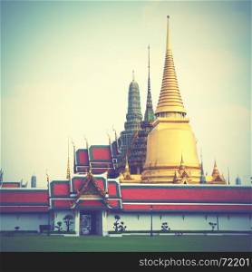 The Wat Phra Kaeo temple in Bangkok, Thailand. Retro style toned image