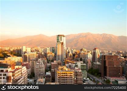 The wealthy neighborhood of Isidora Goyenechea, with El Bosque street and Los Andes Mountain Range in the back, Las Condes district, Santiago, Chile