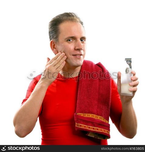 The well-groomed man uses balm after shaving