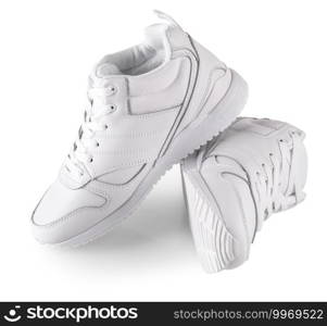 The white women’s winter sneakers isolated on white. Pair of trendy women. white women’s winter sneakers isolated on white. Pair of trendy women