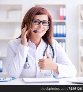 The woman doctor in telemedicine concept. Woman doctor in telemedicine concept