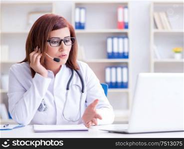 The woman doctor in telemedicine concept. Woman doctor in telemedicine concept
