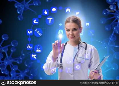 The woman doctor in telemedicine futuristic concept. Woman doctor in telemedicine futuristic concept. The woman doctor in telemedicine futuristic concept
