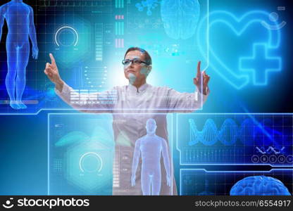 The woman doctor in telemedicine futuristic concept. Woman doctor in telemedicine futuristic concept. The woman doctor in telemedicine futuristic concept