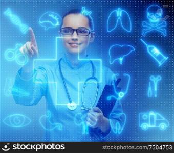 The woman doctor in telemedicine futuristic concept. Woman doctor in telemedicine futuristic concept
