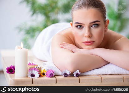 The woman during massage session in spa. Woman during massage session in spa
