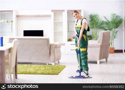 The woman female cleaner cleaning floor. Woman female cleaner cleaning floor