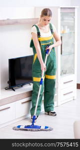 The woman female cleaner cleaning floor. Woman female cleaner cleaning floor