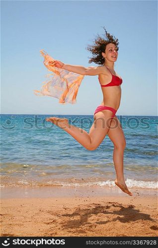 The woman in a jump at the sea