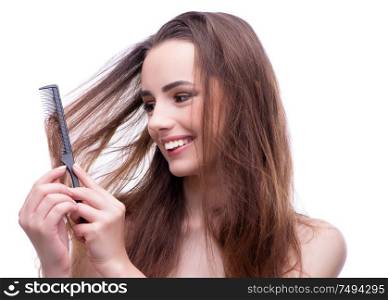 The woman in beauty concept combing hair. Woman in beauty concept combing hair