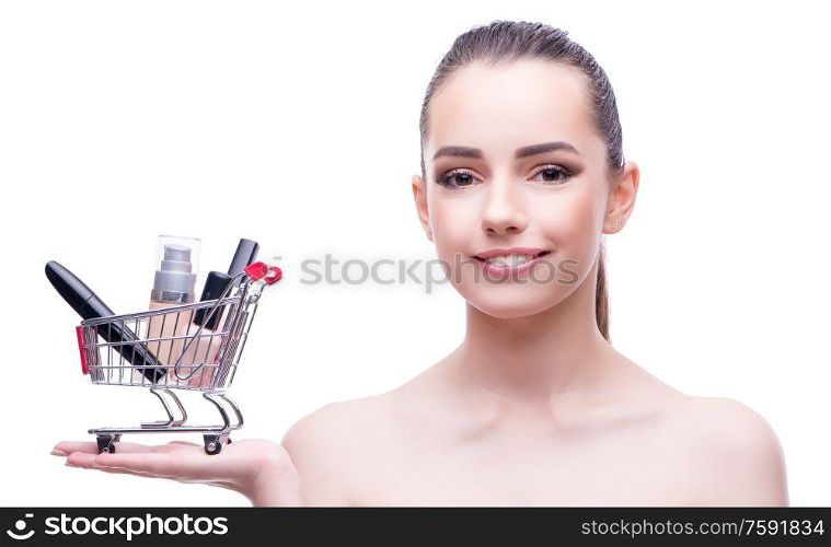 The woman in beauty concept with make up holding shopping cart. Woman in beauty concept with make up holding shopping cart