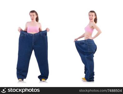 The woman in dieting concept with big jeans. Woman in dieting concept with big jeans