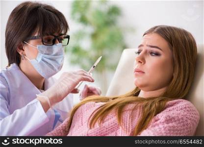 The woman patient visiting dentist for regular check-up. Woman patient visiting dentist for regular check-up