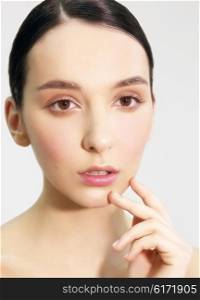 The woman&rsquo;s face with natural make-up, close-up. Fashion trends. Professional model.