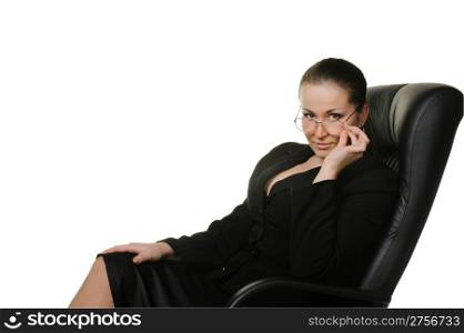 The woman the chief. A portrait of the young girl in a leather armchair