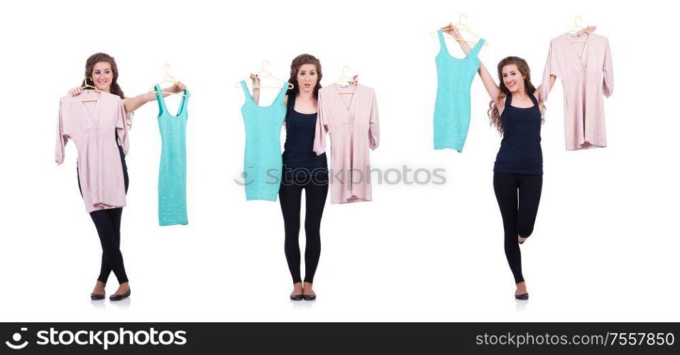 The woman trying new clothing on white. Woman trying new clothing on white