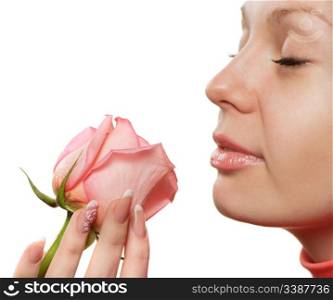 The woman with a rose closeup. Isolated on white