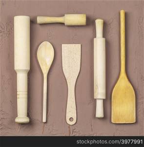 The wooden spoons, spatulas and a rolling pin