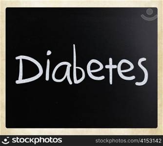 "The word "Diabetes" handwritten with white chalk on a blackboard"