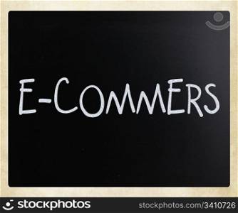 "The word "E-commers" handwritten with white chalk on a blackboard"