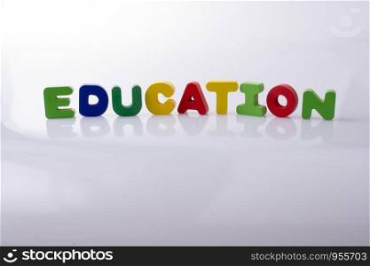 the word EDUCATION written with colorful letter blocks