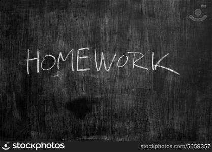 the word homework written on blackboard