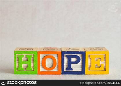 The word hope spelled with colorful blocks isolated on a white background