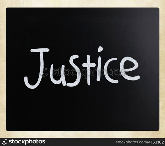 "The word "Justice" handwritten with white chalk on a blackboard"