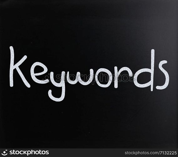"The word "Keywords" handwritten with white chalk on a blackboard"