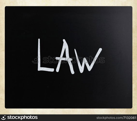 "The word "Law" handwritten with white chalk on a blackboard"