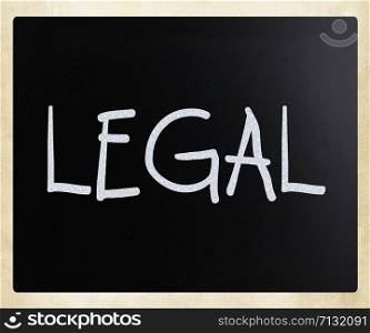 "The word "Legal" handwritten with white chalk on a blackboard"