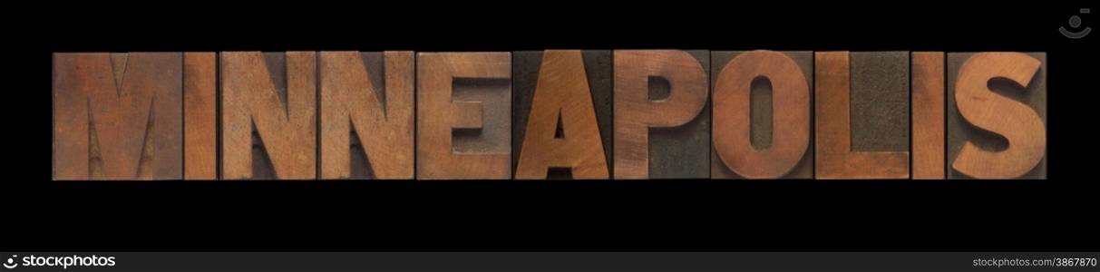 the word Minneapolis in old letterpress wood type