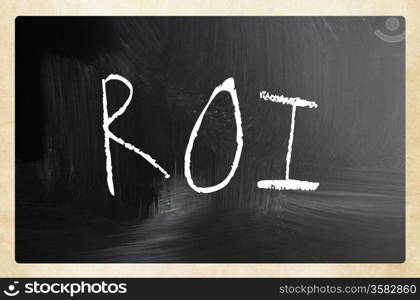 "The word "ROI" handwritten with white chalk on a blackboard."