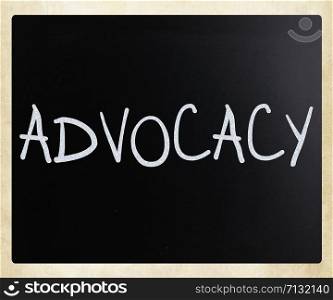 The word &rsquo;Advocacy&rsquo; handwritten with white chalk on a blackboard