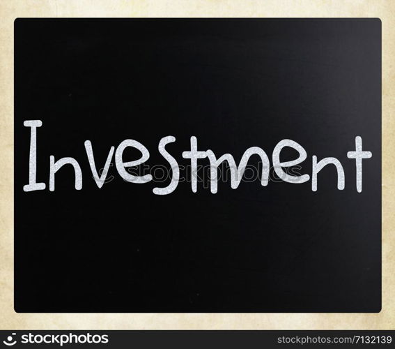 The word &rsquo;Investment&rsquo; handwritten with white chalk on a blackboard