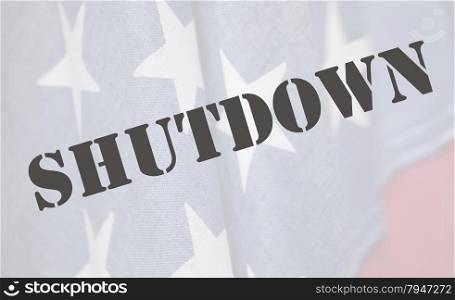 the word shutdown in a stencil font on an old USA flag