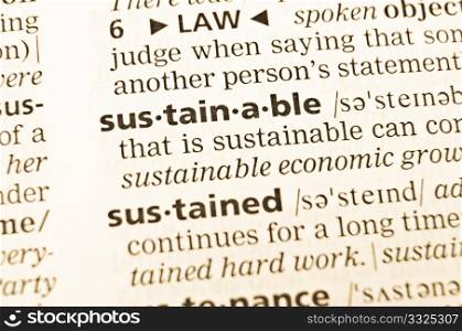 The word sustainable in the old dictionary. Selective focus effect.