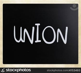 "The word "Union" handwritten with white chalk on a blackboard"