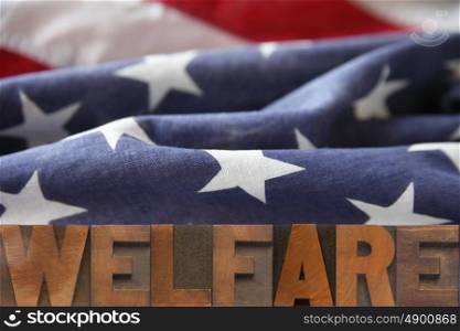the word welfare on an American flag background