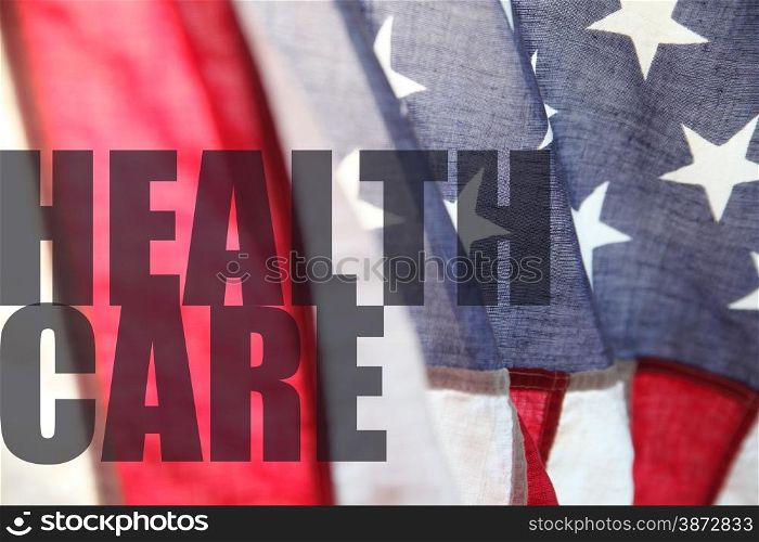 the words health care seen over an American flag