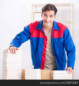 The worker in publishing house preparing book order. Worker in publishing house preparing book order