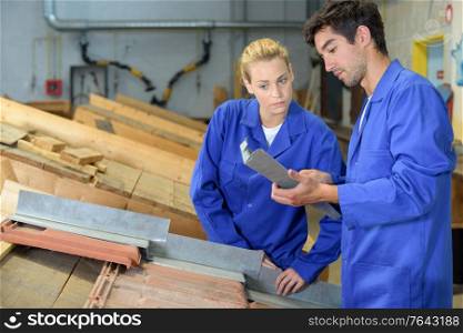 the workers in carpentry workshop