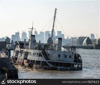 The wreck of the Royal Iris ferry boat that is sinking in London Docklands near the Thames Barrier. Royal Iris ferry boat abandoned and sinking into river Thames
