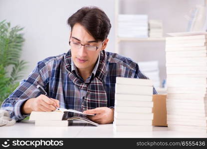 The writer presenting his books to public. Writer presenting his books to public