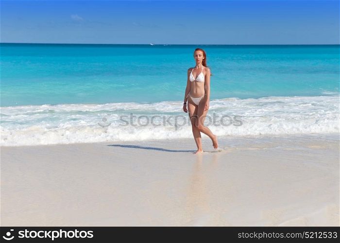The young attractive woman on the sea coast