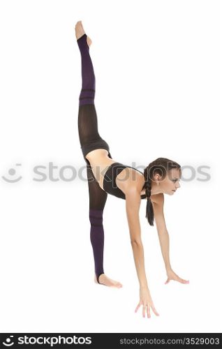 The young beautiful gymnast on training. Isolated on white.