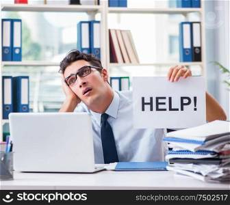 The young businessman asking for help in office. Young businessman asking for help in office