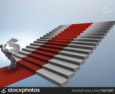 The young businessman climbing stairs and red carpet. Young businessman climbing stairs and red carpet